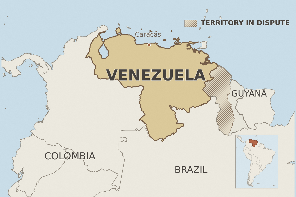 Map of Venezuela with Caracas, Colombia, Brazil, and Guyana labeled; a hatched area marks disputed territory in western Guyana, and an inset shows Venezuela in South America.